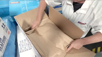 man performing testing in a warehouse